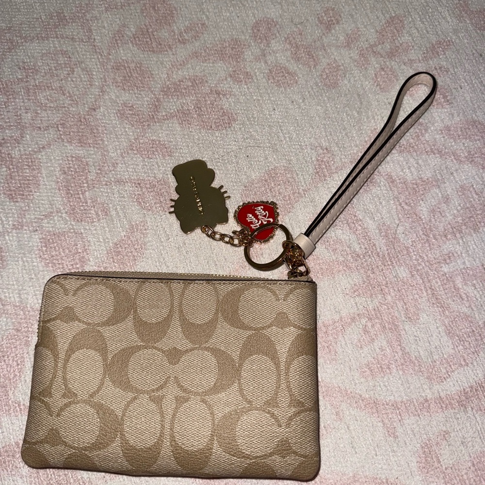 Coach Tan Wristlet with Hello Kitty Charm - Picture 2 of 3